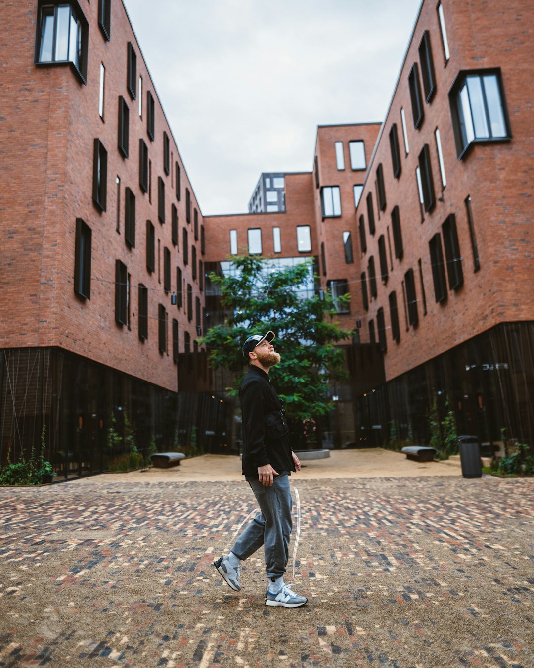 Portrait of a Danish teenage skateboarder in an urban area