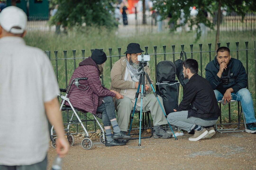 documentary photographer interviewing local hero