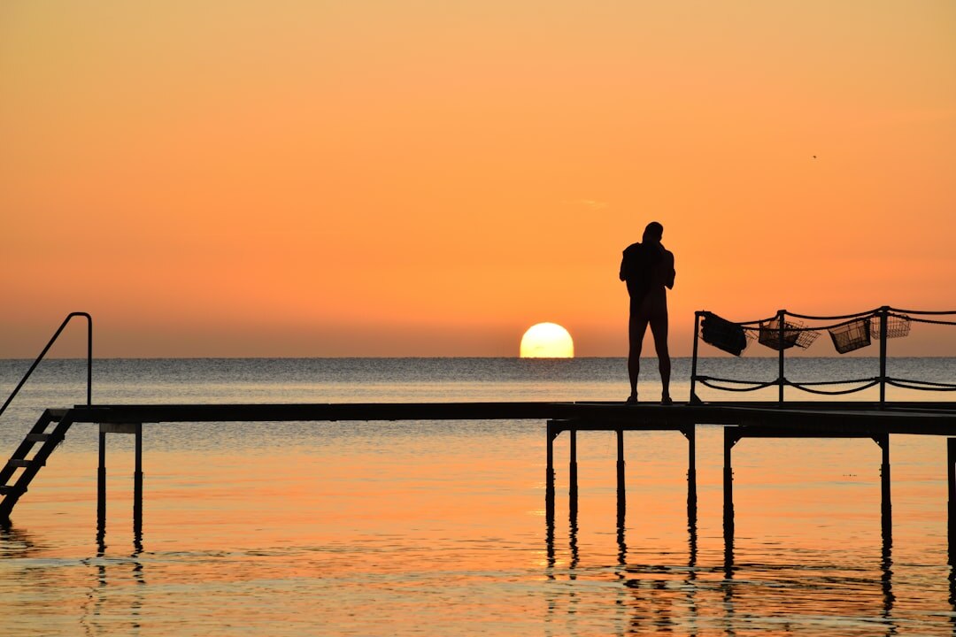 elderly man fishing in denmark