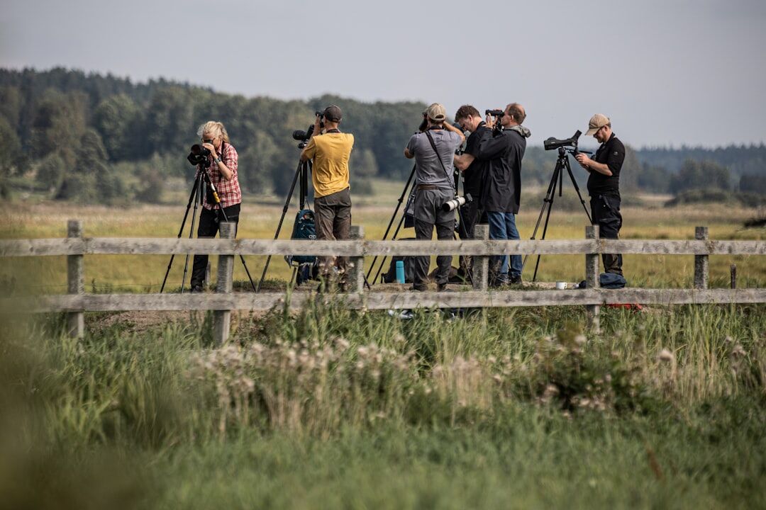 Small team of Danish photographers and editors standing together